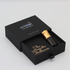 EUPHORIA's elegant packaging featuring a black box and a gold-colored pen